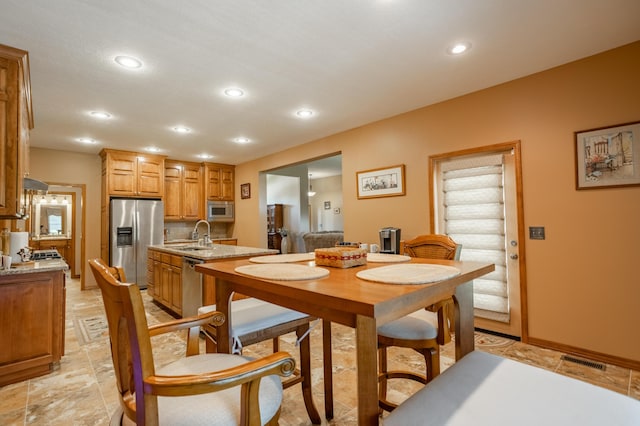 8326 Shinnecock Dr, Nixa, MO 65714 - dining space with recessed lighting and baseboards