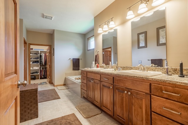 8326 Shinnecock Dr, Nixa, MO 65714 - full bath featuring a bath, double vanity, a spacious closet, and tile patterned floors