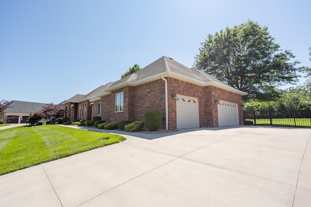 8326 Shinnecock Dr, Nixa, MO 65714 - view of front facade featuring a garage, brick siding, concrete driveway, and a shingled roof