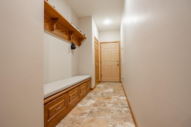 8326 Shinnecock Dr, Nixa, MO 65714 - mudroom with baseboards and light stone finish flooring