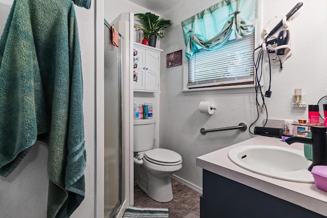 1127 E Livingston Ct, Springfield, MO 65803 - bathroom featuring a stall shower, vanity, and toilet