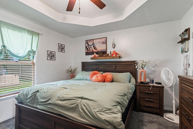 1127 E Livingston Ct, Springfield, MO 65803 - bedroom with dark carpet, a tray ceiling, baseboards, and a ceiling fan