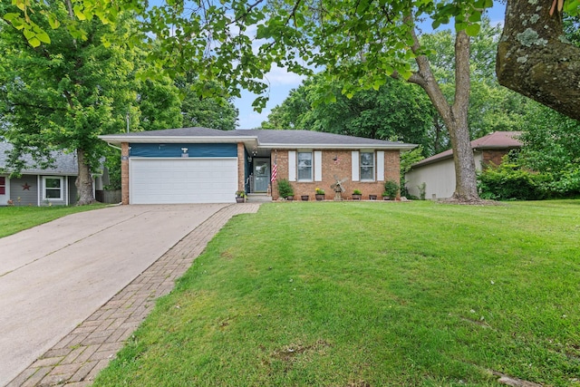 1127 E Livingston Ct, Springfield, MO 65803 - view of front of house with brick siding, an attached garage, concrete driveway, and a front lawn