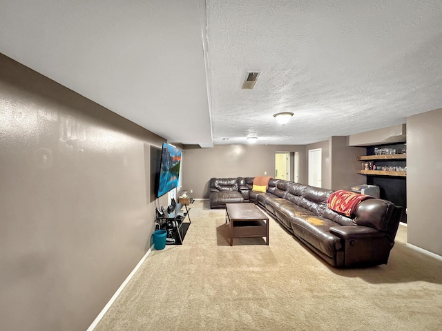 5726 S Fairview Ave, Springfield, MO 65810 - living area featuring carpet floors, baseboards, and a textured ceiling