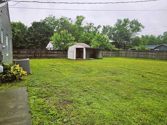 107 W Poplar St, El Dorado Springs, MO 64744 - view of yard featuring central air condition unit
