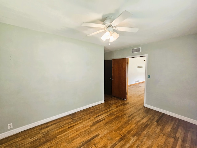 107 W Poplar St, El Dorado Springs, MO 64744 - unfurnished room featuring wood finished floors, baseboards, and a ceiling fan