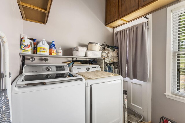 638 Double Day, Branson West, MO 65737 - laundry area featuring washing machine and dryer, cabinet space, and plenty of natural light