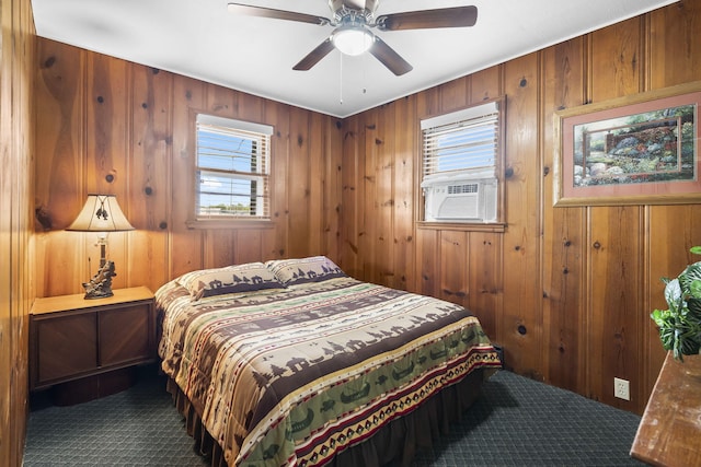 638 Double Day, Branson West, MO 65737 - carpeted bedroom featuring multiple windows, wooden walls, cooling unit, and a ceiling fan