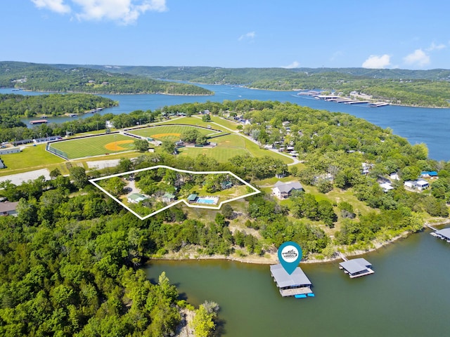 638 Double Day, Branson West, MO 65737 - view of property location with a nearby body of water, property boundaries highlighted, and a forest