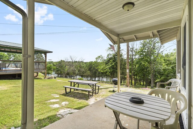 638 Double Day, Branson West, MO 65737 - view of patio / terrace featuring a deck and view of scattered trees