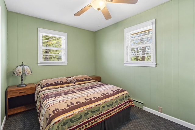 638 Double Day, Branson West, MO 65737 - carpeted bedroom with a baseboard radiator, a ceiling fan, and baseboards