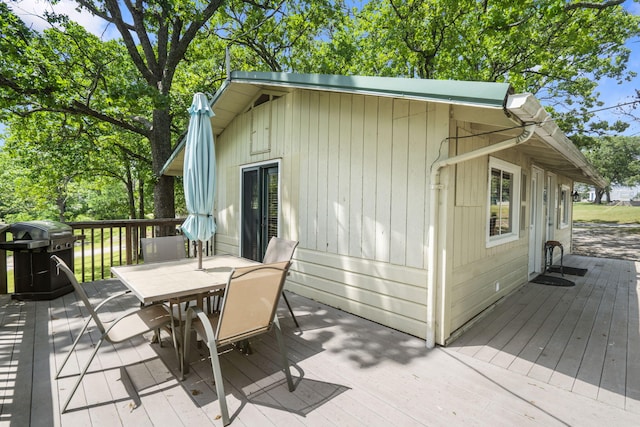 638 Double Day, Branson West, MO 65737 - wooden deck with outdoor dining space and area for grilling