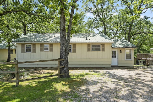 638 Double Day, Branson West, MO 65737 - view of front of house featuring metal roof and a wooden deck
