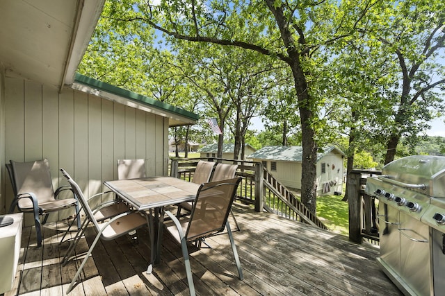 638 Double Day, Branson West, MO 65737 - wooden deck with outdoor dining area and area for grilling