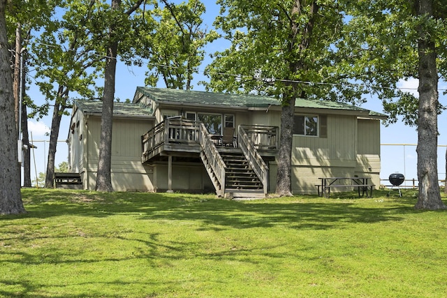 638 Double Day, Branson West, MO 65737 - back of house featuring stairs, a deck, and a yard