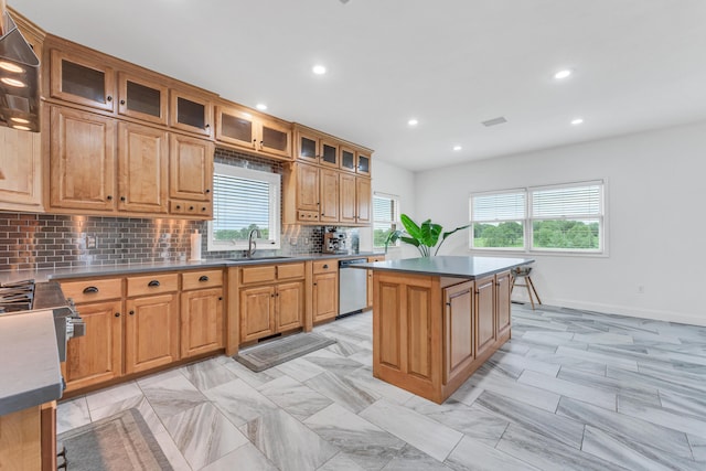 108 Island Green Dr, Republic, MO 65738 - kitchen with a sink, backsplash, a center island, recessed lighting, and stainless steel appliances