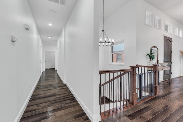108 Island Green Dr, Republic, MO 65738 - hallway featuring an upstairs landing, dark wood-type flooring, baseboards, a chandelier, and recessed lighting