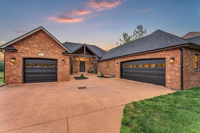 108 Island Green Dr, Republic, MO 65738 - view of front of property with concrete driveway, brick siding, and a garage