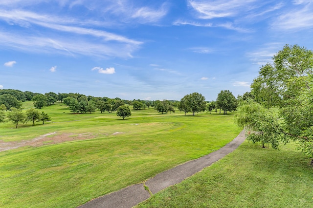 108 Island Green Dr, Republic, MO 65738 - view of community featuring a yard, view of wooded area, and view of golf course