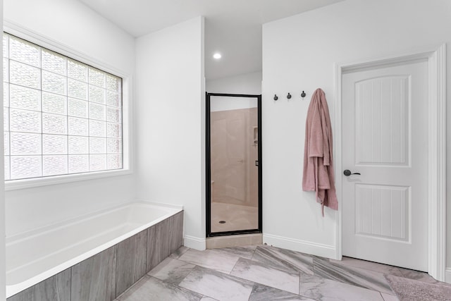 108 Island Green Dr, Republic, MO 65738 - full bathroom with a garden tub, a shower stall, baseboards, and marble finish floors