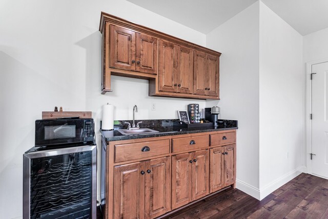 108 Island Green Dr, Republic, MO 65738 - kitchen with black microwave, dark wood finished floors, a sink, wine cooler, and baseboards