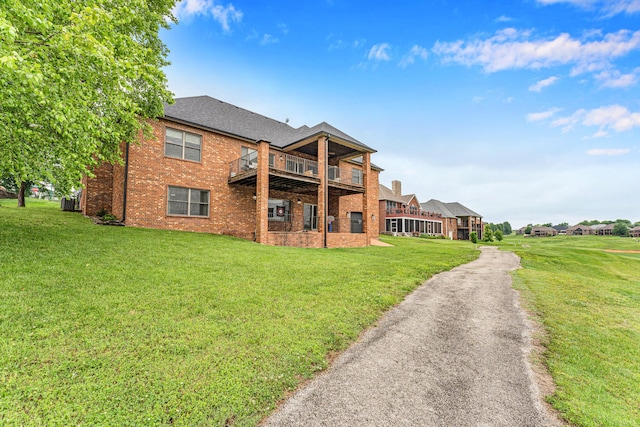 108 Island Green Dr, Republic, MO 65738 - view of front of property with brick siding, a front lawn, and roof with shingles