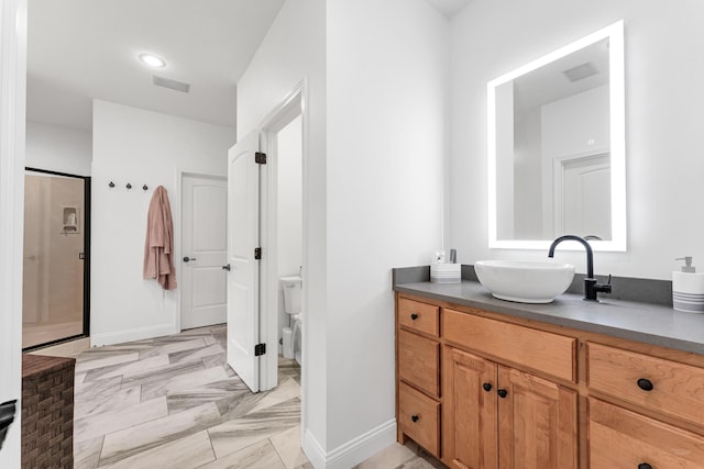 108 Island Green Dr, Republic, MO 65738 - bathroom with vanity, baseboards, a shower stall, and toilet