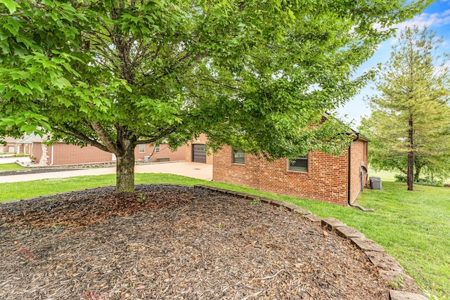 108 Island Green Dr, Republic, MO 65738 - view of property hidden behind natural elements with brick siding and a front yard