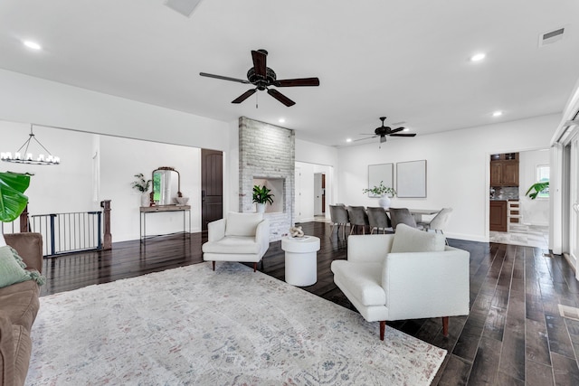 108 Island Green Dr, Republic, MO 65738 - living area featuring a ceiling fan, dark wood finished floors, recessed lighting, a chandelier, and baseboards