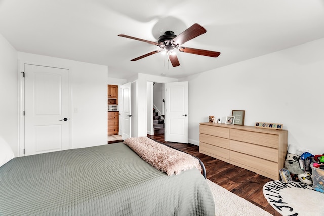 108 Island Green Dr, Republic, MO 65738 - bedroom featuring dark wood-type flooring, ceiling fan, and baseboards