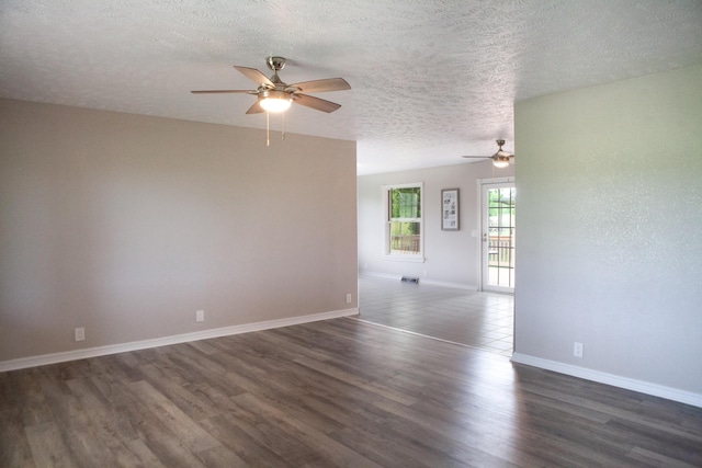 18627 Farm Rd Unit 1075, Exeter, MO 65647 - empty room with ceiling fan, dark wood-type flooring, a textured ceiling, and baseboards