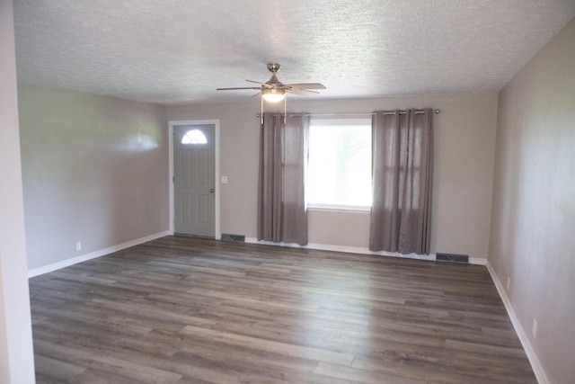 18627 Farm Rd Unit 1075, Exeter, MO 65647 - unfurnished room featuring a ceiling fan, a textured ceiling, wood finished floors, and baseboards
