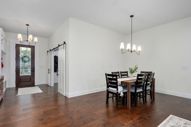 498 Mockingbird, Rogersville, MO 65742 - dining space featuring a chandelier, dark wood-style flooring, a barn door, and baseboards