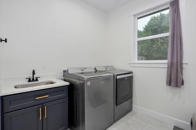 498 Mockingbird, Rogersville, MO 65742 - laundry area featuring washer and clothes dryer, cabinet space, and baseboards