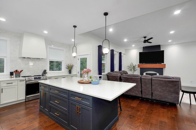 498 Mockingbird, Rogersville, MO 65742 - kitchen with stainless steel range with electric stovetop, custom range hood, white cabinetry, a ceiling fan, and dark wood finished floors