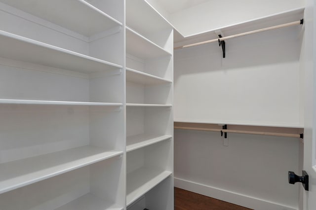 1756 N Marlowe Ave, Springfield, MO 65802 - spacious closet featuring dark wood finished floors