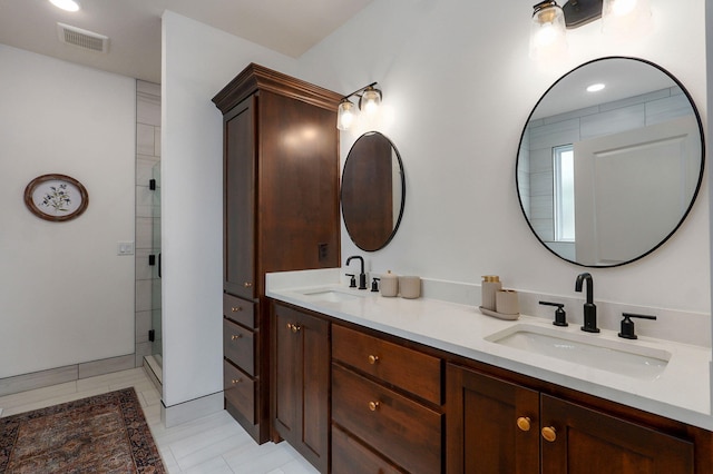 1756 N Marlowe Ave, Springfield, MO 65802 - bathroom featuring double vanity, a shower stall, and tile patterned floors