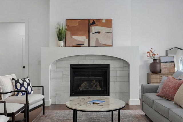 1756 N Marlowe Ave, Springfield, MO 65802 - living area featuring wood finished floors, a fireplace, and baseboards