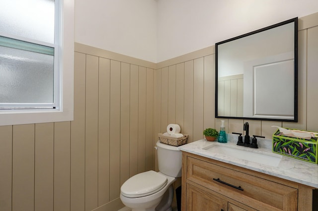1756 N Marlowe Ave, Springfield, MO 65802 - half bath featuring vanity, toilet, and wainscoting