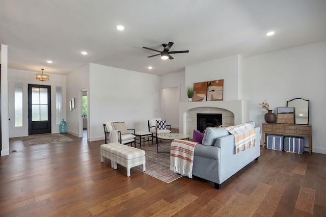 1756 N Marlowe Ave, Springfield, MO 65802 - living area with dark wood-style flooring, a fireplace, a ceiling fan, recessed lighting, and baseboards