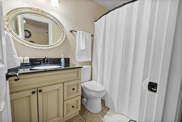 180 Grace Chapel Rd Unit 321, Blue Eye, MO 65611 - full bath featuring vanity, toilet, tile patterned flooring, and a shower with shower curtain