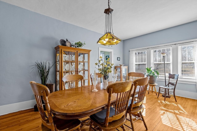 310 S Main St, Licking, MO 65542 - dining room featuring baseboards and light wood-type flooring