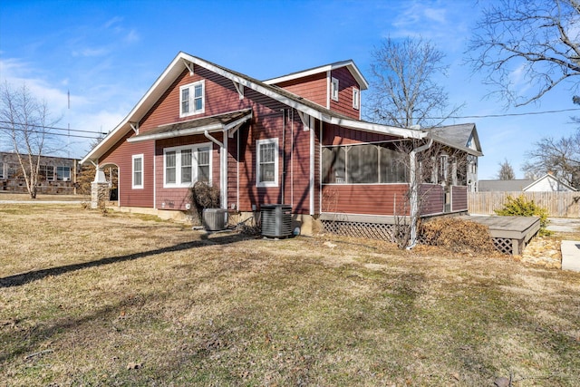 310 S Main St, Licking, MO 65542 - view of side of home with a sunroom and central AC