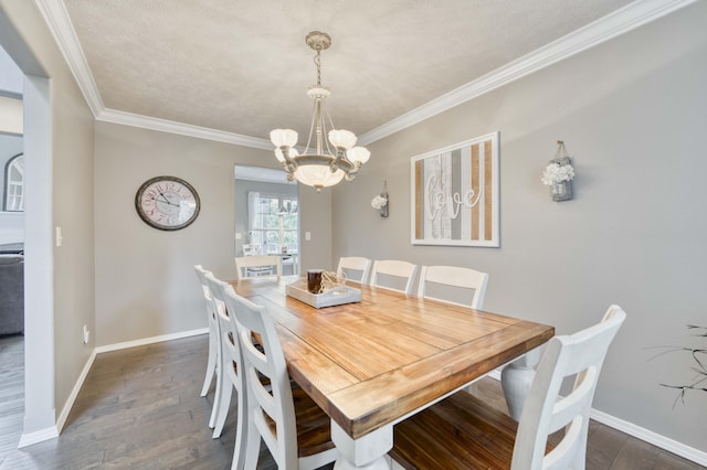 287 Appletree Dr, Ozark, MO 65721 - dining space with a chandelier, ornamental molding, baseboards, and dark wood-style flooring