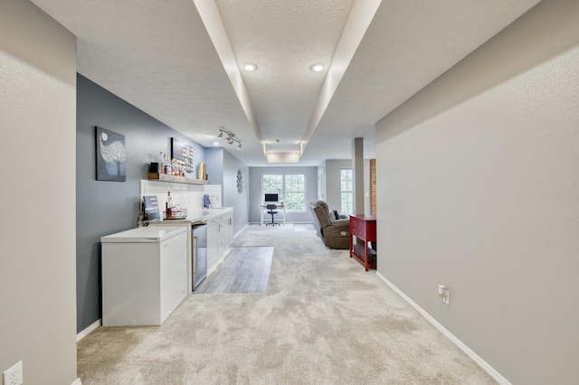 287 Appletree Dr, Ozark, MO 65721 - hall featuring light carpet, a textured ceiling, baseboards, and recessed lighting