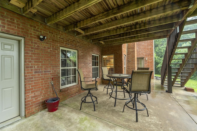 287 Appletree Dr, Ozark, MO 65721 - view of patio with stairway and outdoor dining area