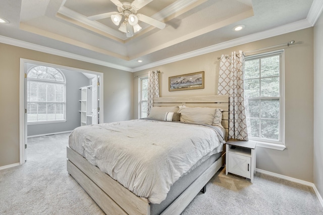 287 Appletree Dr, Ozark, MO 65721 - carpeted bedroom with multiple windows, a tray ceiling, ornamental molding, baseboards, and recessed lighting