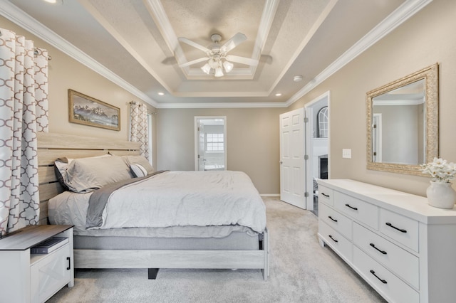 287 Appletree Dr, Ozark, MO 65721 - bedroom with a raised ceiling, light carpet, crown molding, ceiling fan, and recessed lighting