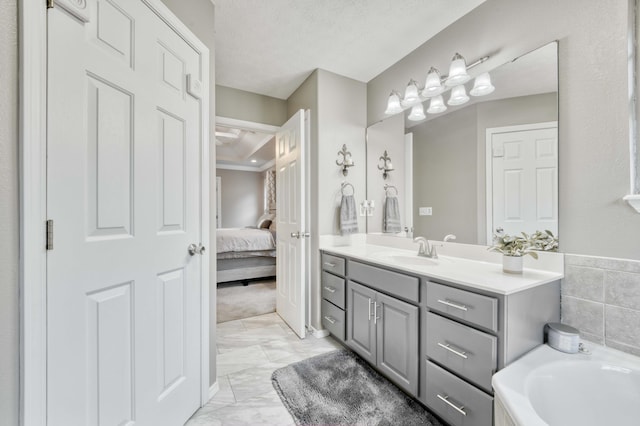 287 Appletree Dr, Ozark, MO 65721 - ensuite bathroom with marble finish flooring, vanity, and a bath