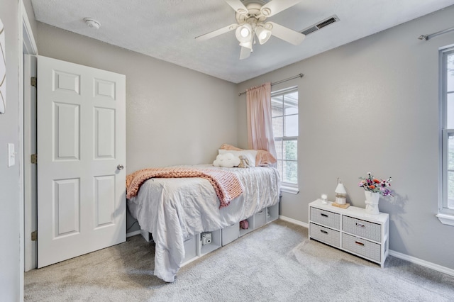 287 Appletree Dr, Ozark, MO 65721 - carpeted bedroom with baseboards and ceiling fan